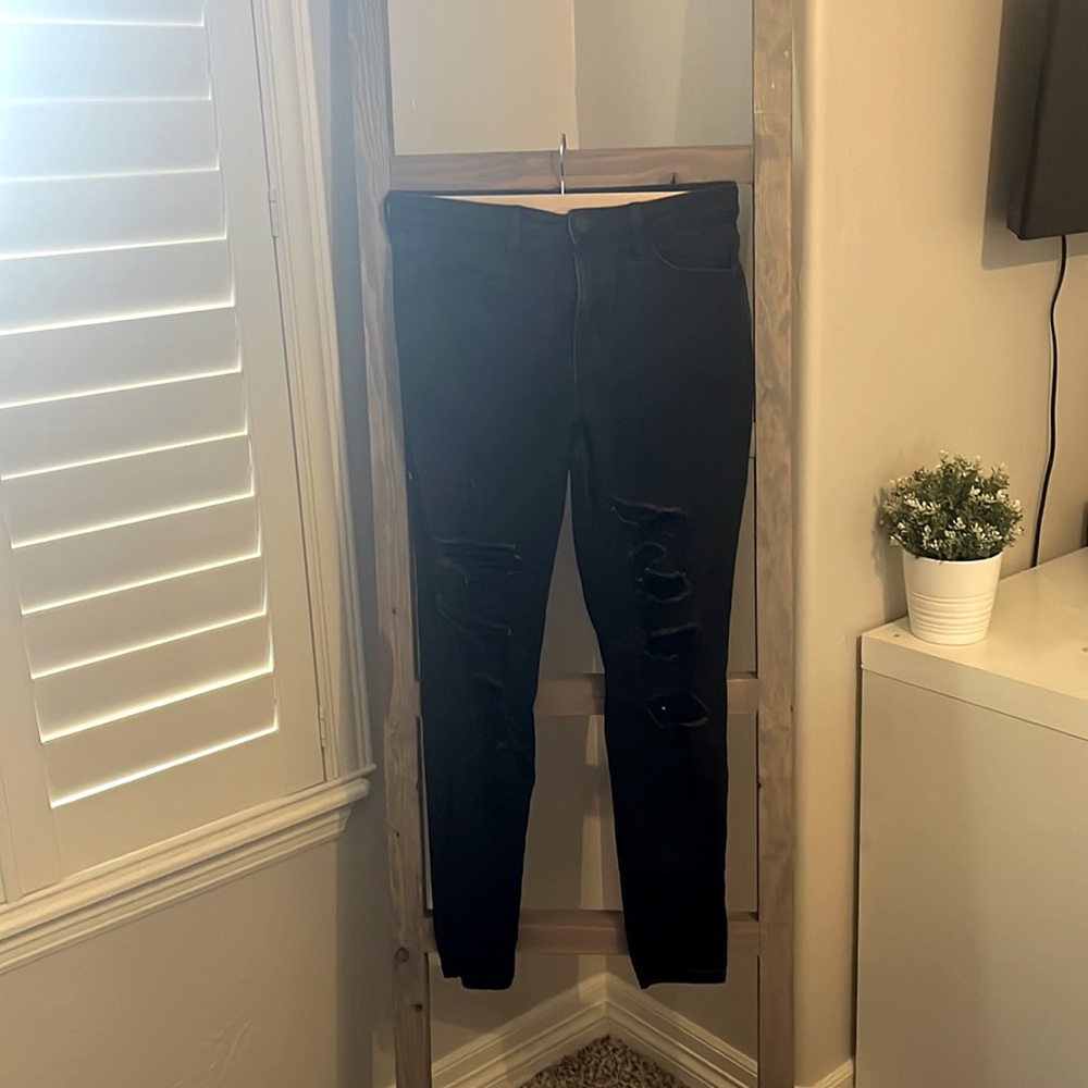 Black ripped stretchy skinny jeans